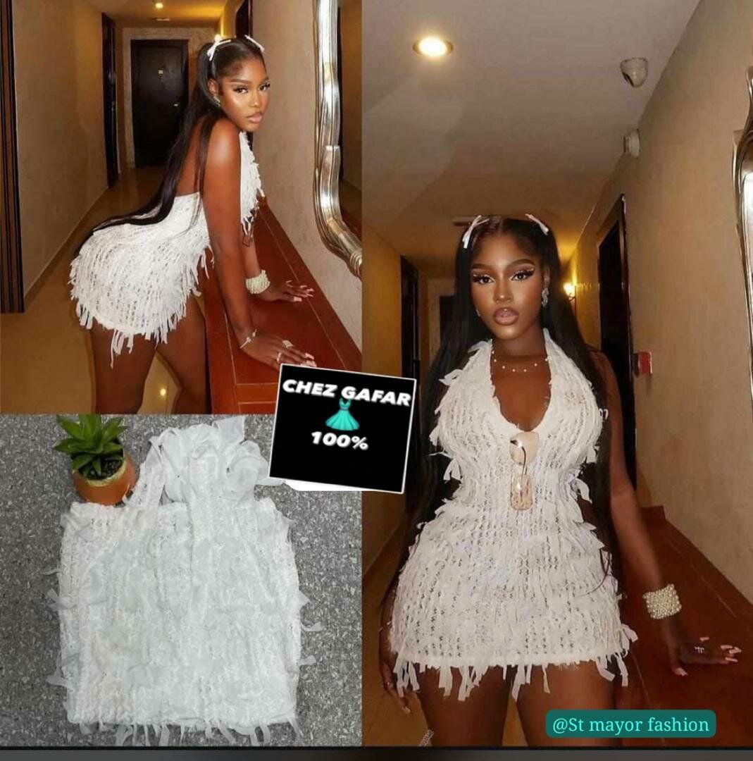 Robe blanche à franges