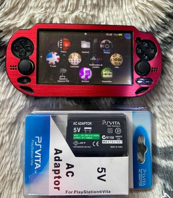 Console PSVITA avec chargeur