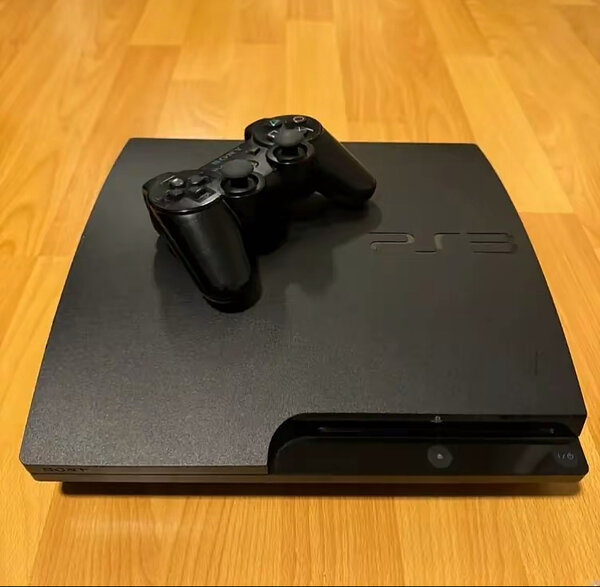 Console PS3 avec manettes