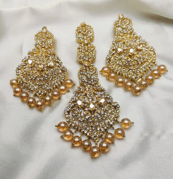Casting Fine Quality Ganga Jamni bindiya and Earrings