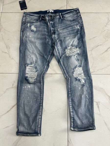 Jeans déchirés tendance homme
