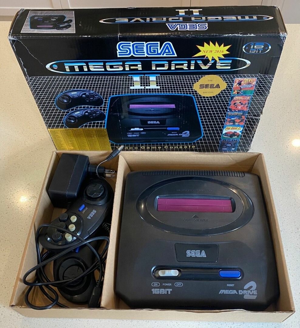 Sega Mega Drive II with games inside including Sonic