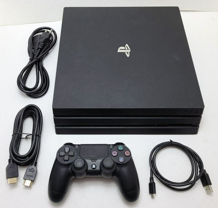 Console Sony PlayStation 4 ou PlayStation 3 avec manette