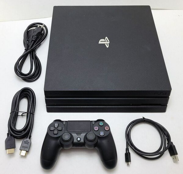 Console Sony PlayStation 4 ou PlayStation 3 avec manette