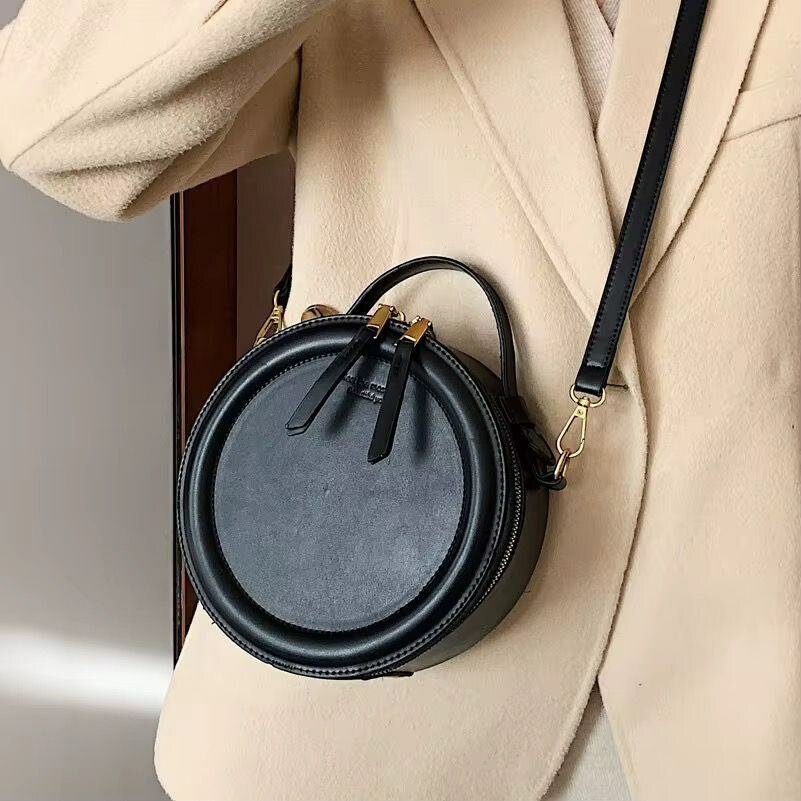 Sac bandoulière rond élégant