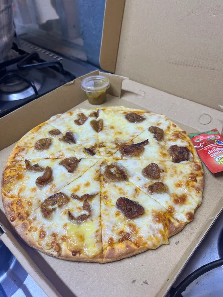 Pizza savoureuse Alloco moyen