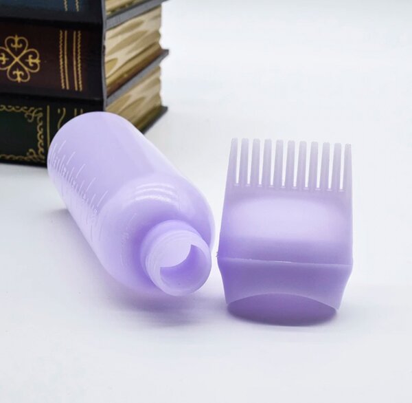Bouteille applicatrice à peigne