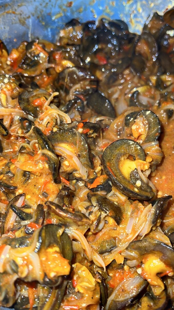 Escargots épicés en sauce