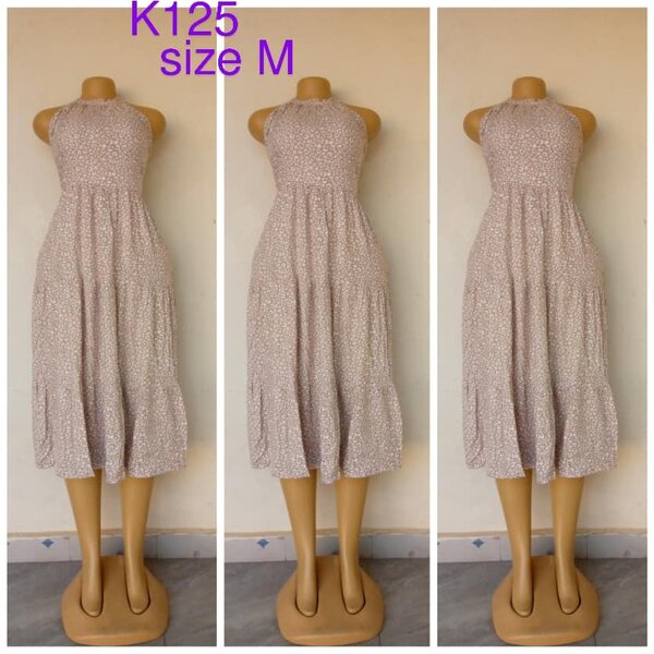 Beige dress with floral print, size M