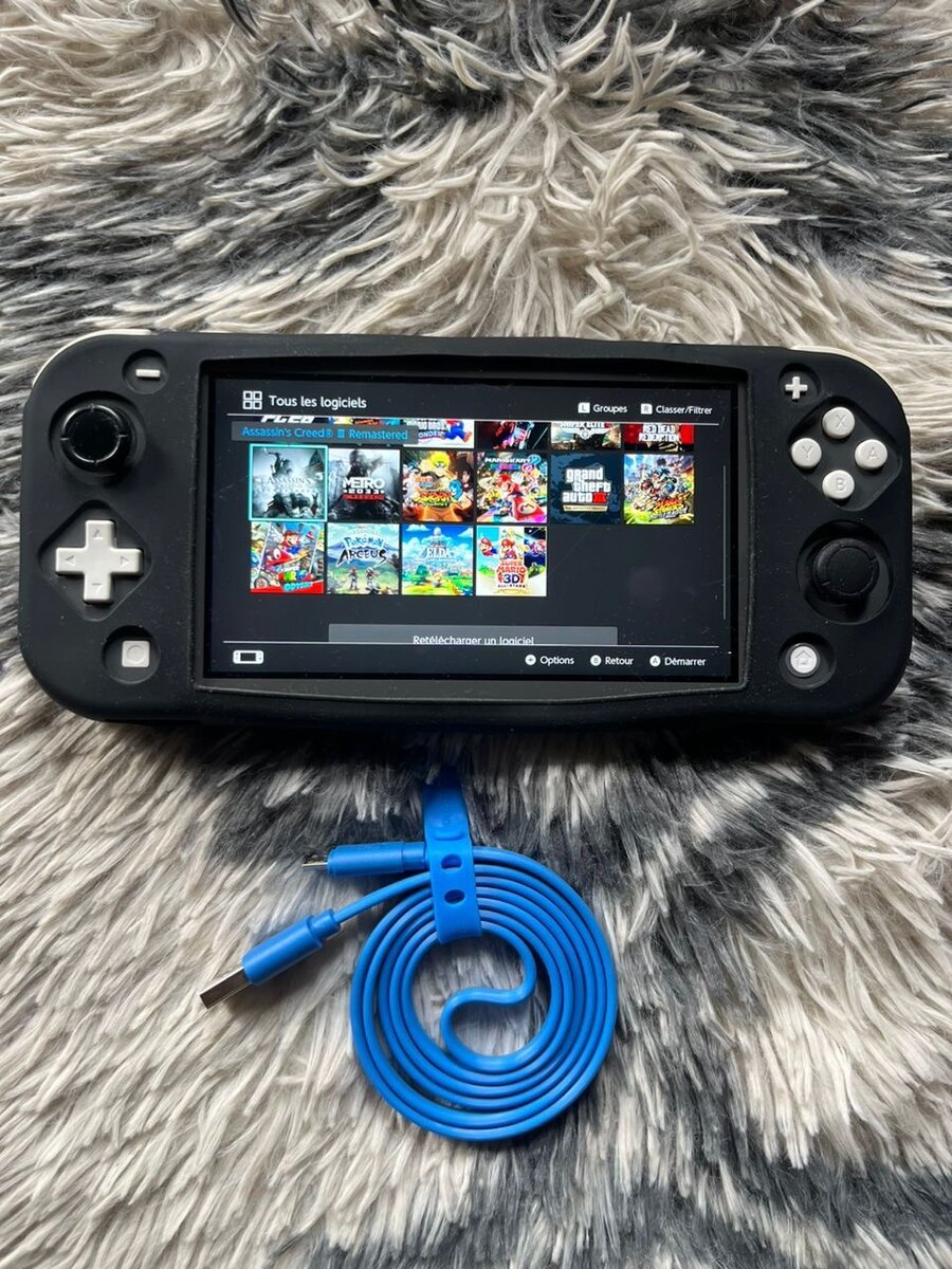 NINTENDO SWITCH LITE + 15 jeux