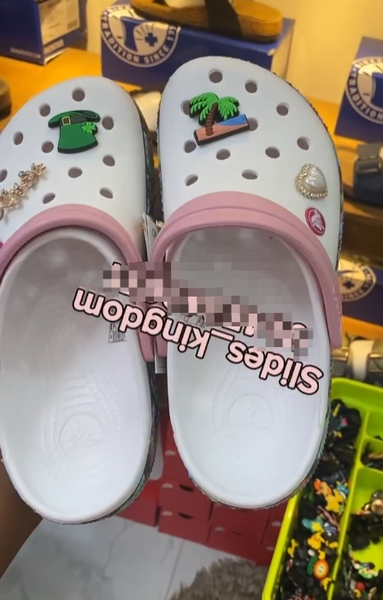 Women's pink and white crocs