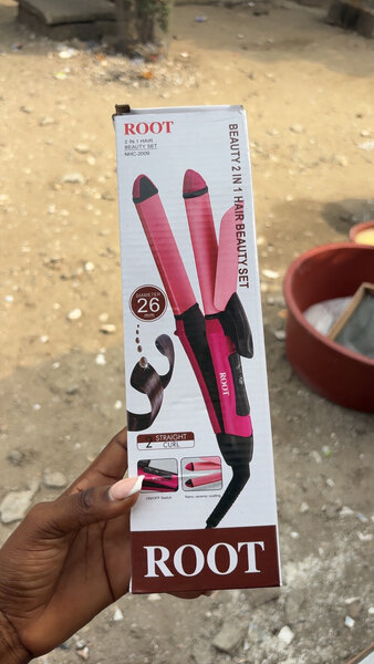 Fer à lisser et boucler 2-en-1