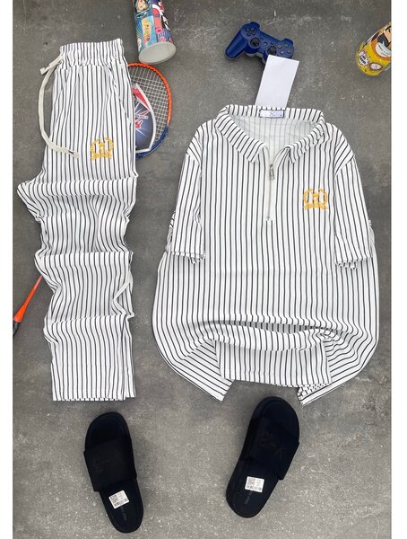 Tenu de sport homme à rayures