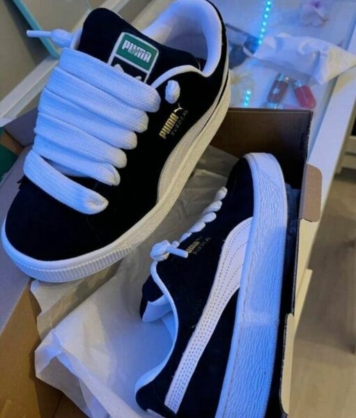 Puma baskets noires et blanches