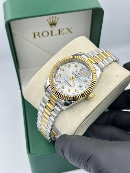 Montre Rolex élégante bicolore