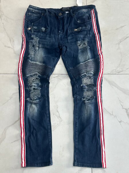 Jeans déchirés tendance homme