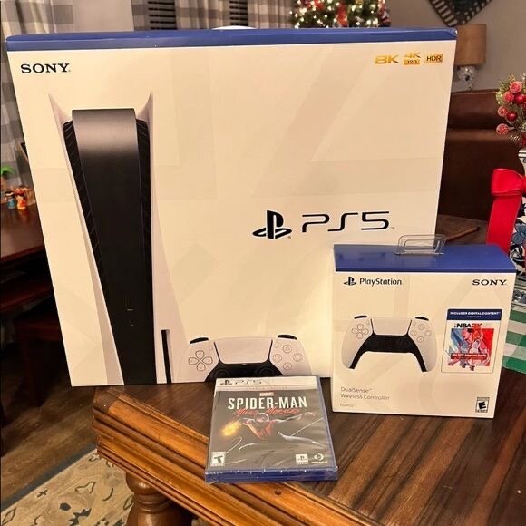 Console Sony PS5 avec manette et Spider-Man