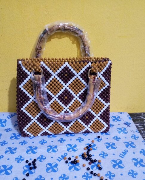 Sac à main perlé élégant