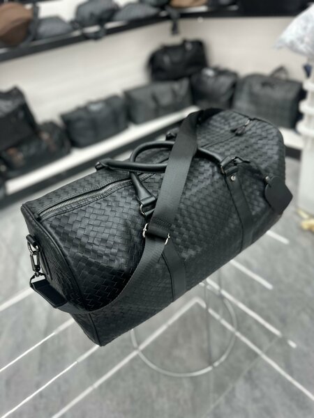 Sac de voyage en cuir tressé