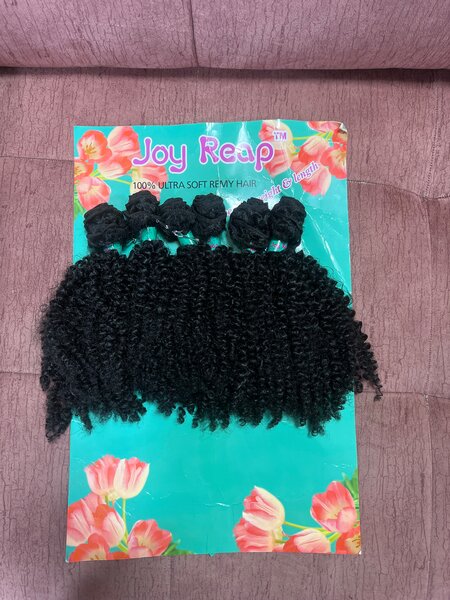 Extensions cheveux bouclés