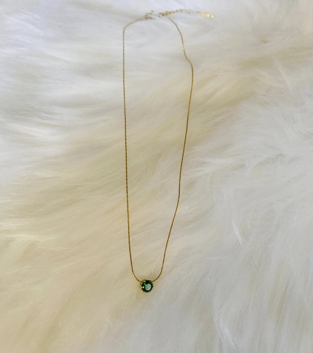 Pendant with green crystal