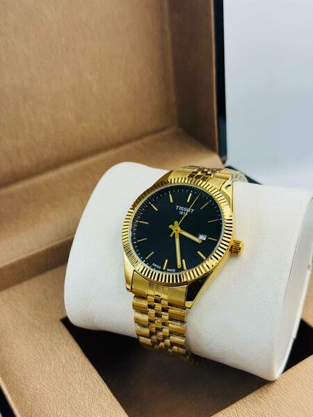 Montre en acier inoxydable dorée