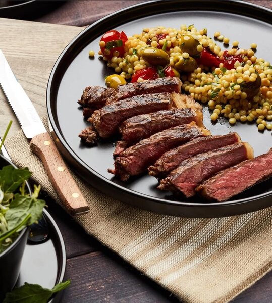 Black ceramic dinner plate