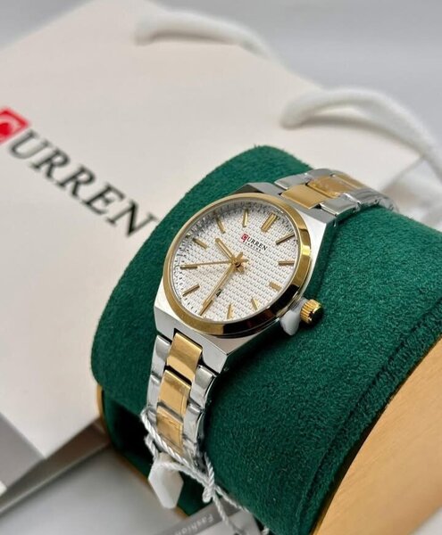 Montre élégante bicolore