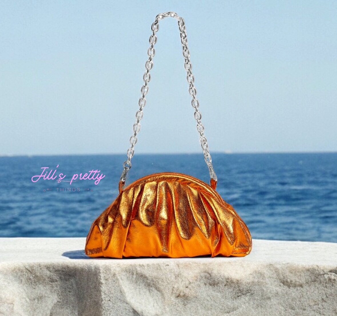 Orange metallic bag