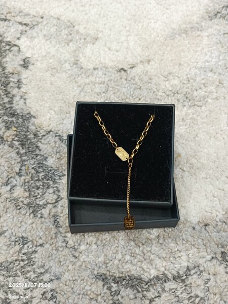 Collier pendentif étoiles dorées