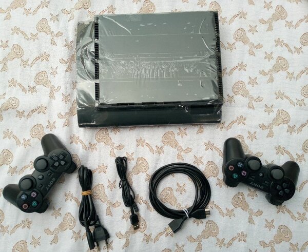 PS3 Ultra slim craquée 20 jeux