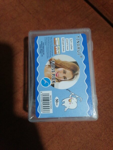 Cure-dents en fil dentaire