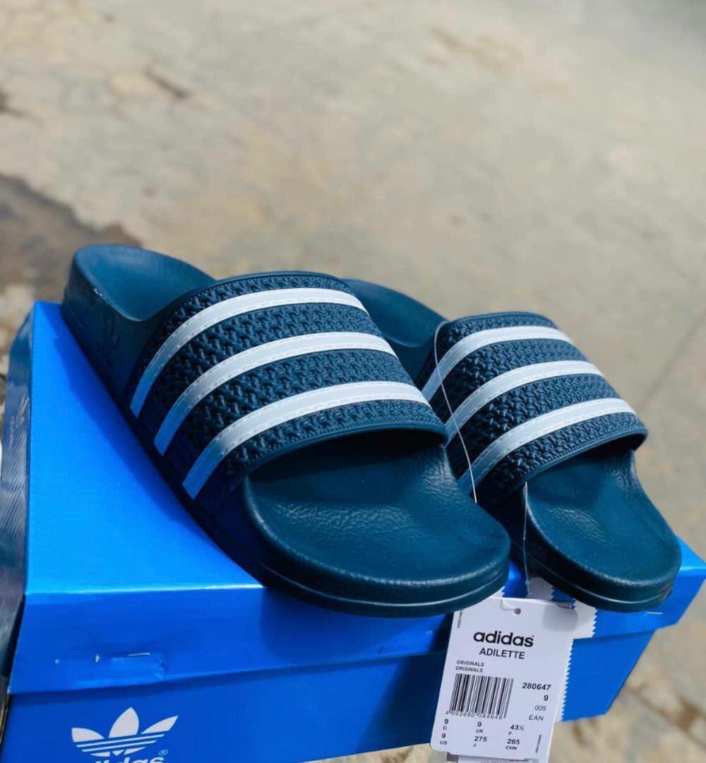 Adidas slides and Nike slides