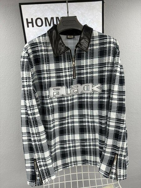 Pull à carreaux avec zip