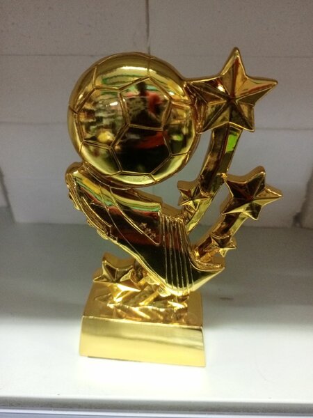 Trophée de football doré