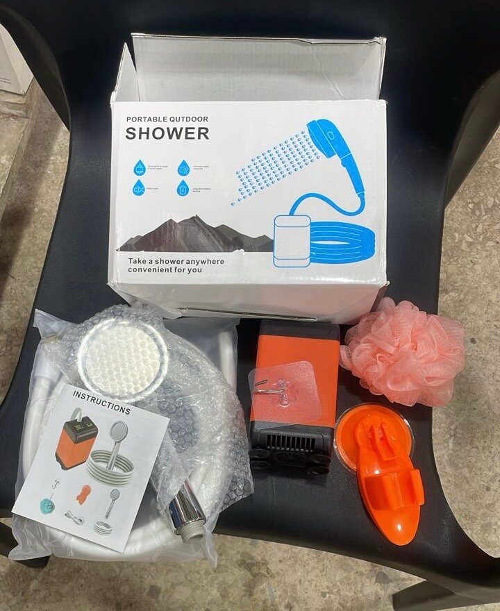 Pompe de douche électrique portable