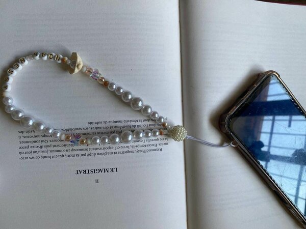 Cordon de téléphone perlé élégant