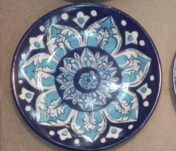Blue pottery wall hanging plates.. 10 inches Approx 