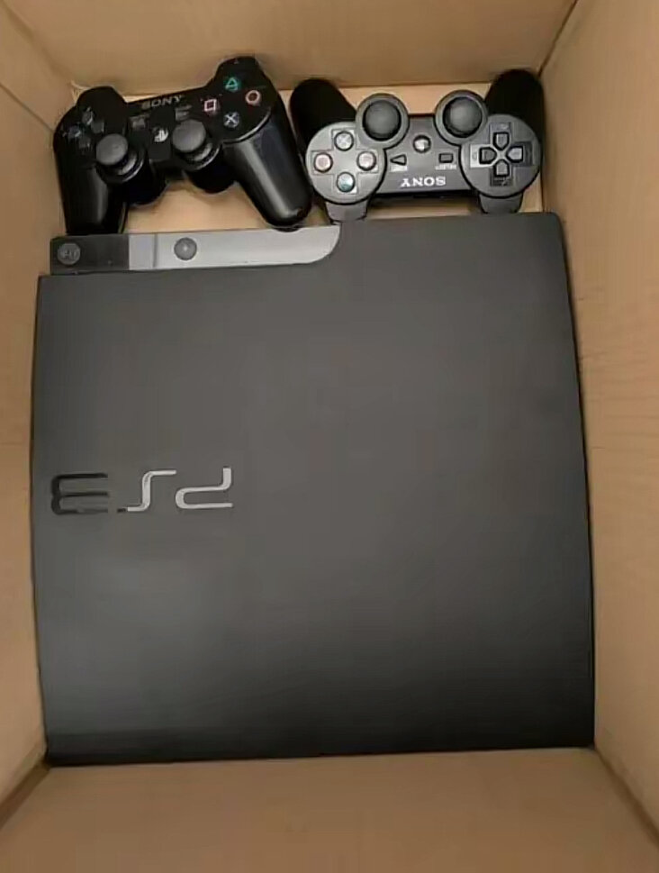 Console PS3 avec manettes