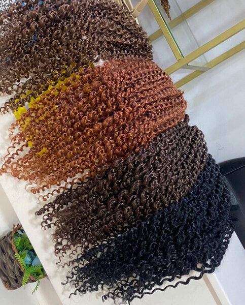 Extensions cheveux bouclés