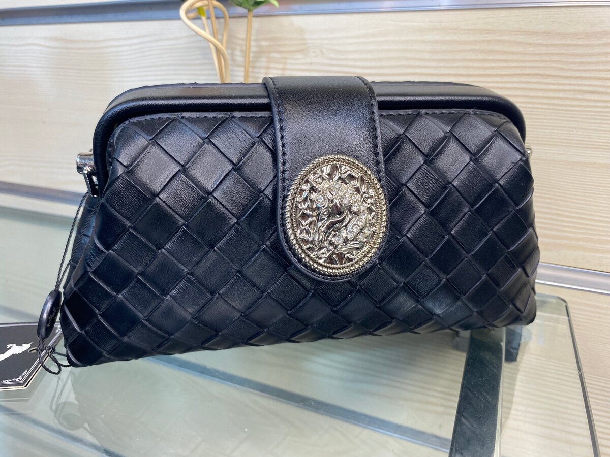 Pochette en cuir tressé