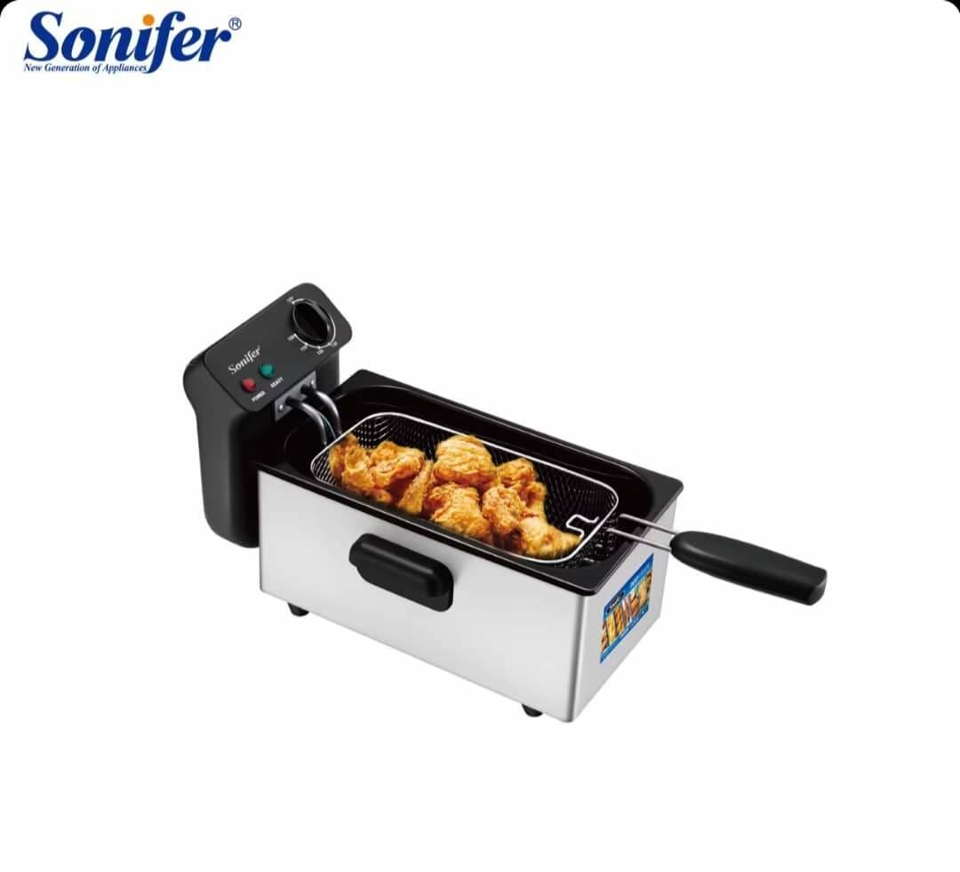 Friteuse électrique à huile .