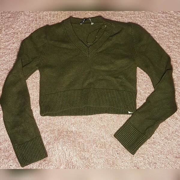 Pull court en maille verte