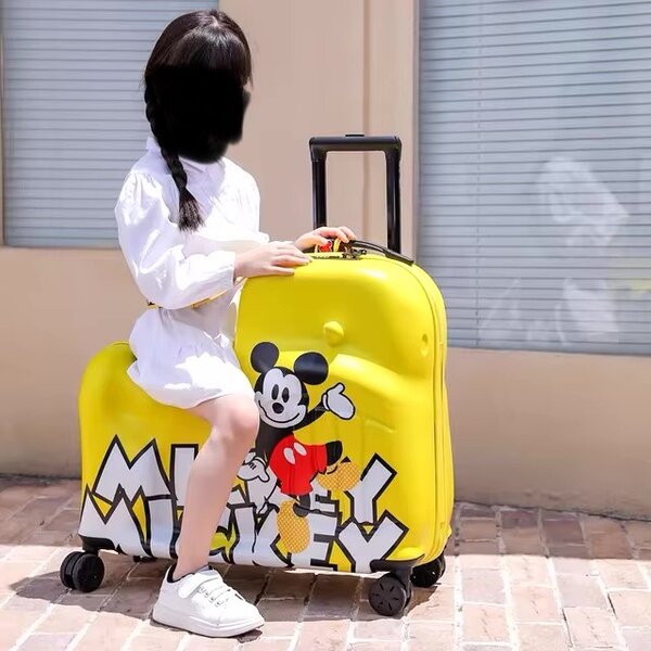 Kids ride on suitcase