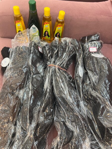 Extensions cheveux naturels bouclés