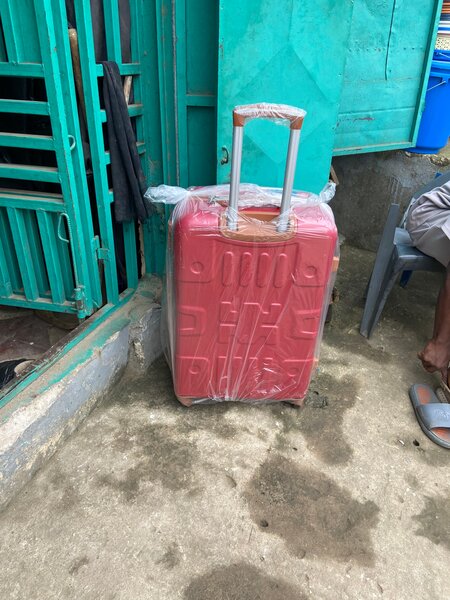 Valise rigide extensible rouge
