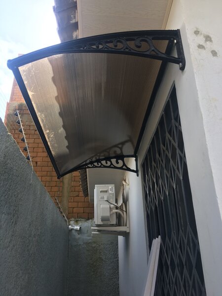 Auvent mural polycarbonate