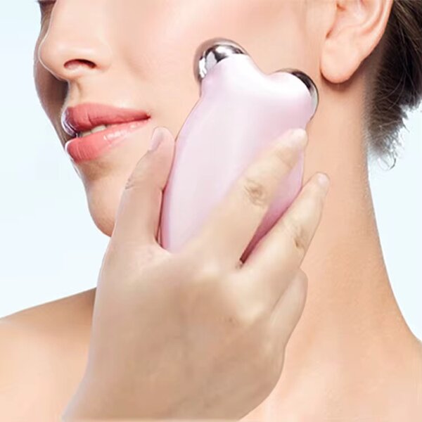 Appareil de massage facial électrique