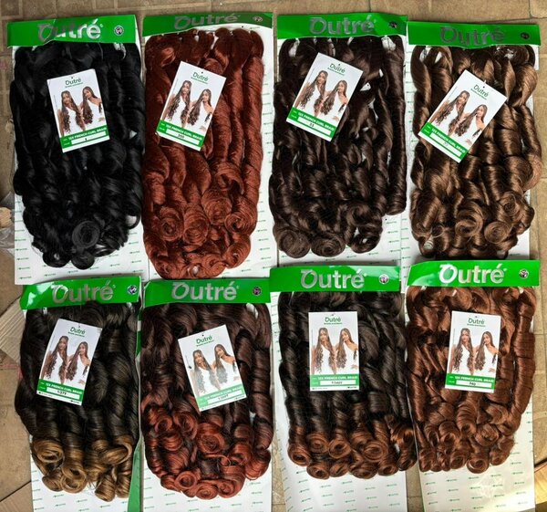 Extensions bouclées synthétiques