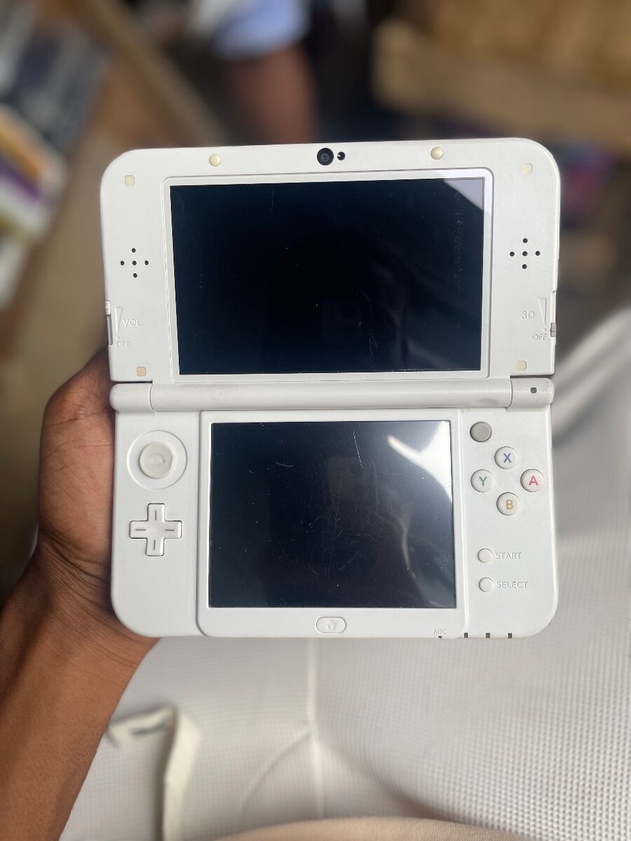 Nintendo new  3DS Xl occasion + 25 jeux